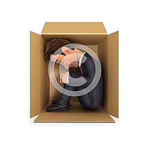 3d businessman inside cardboard box